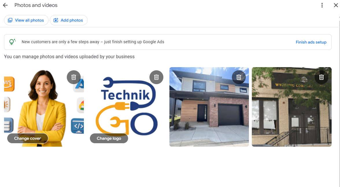 Google Business Profile photos and videos dashboard showing uploaded business images, including a professional cover photo, TechnikGo company logo, residential office building exterior, and a Wyoming Commerce building sign, with options to change cover, change logo, add photos, and manage uploaded media.